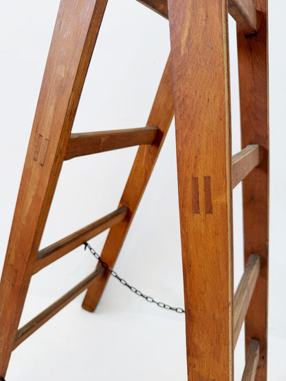 Wooden A-frame ladder with iron hardware, mid-20th century