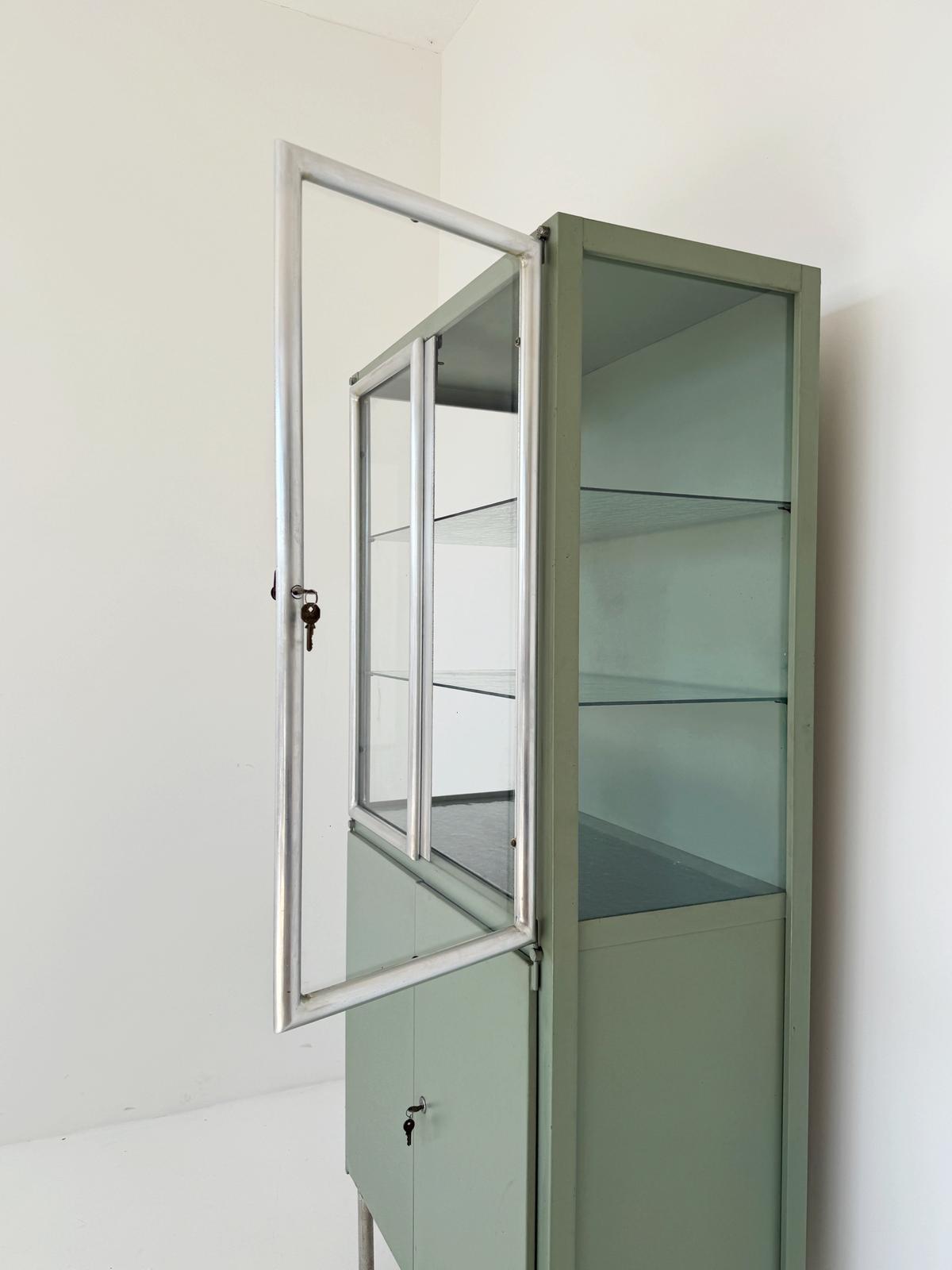 Sage green industrial display cabinet, 1950s