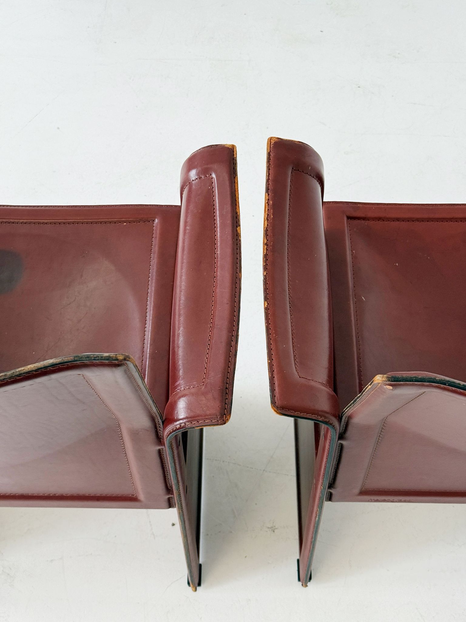 Set of four Matteo Grassi armchairs in burgundy leather, 1980s
