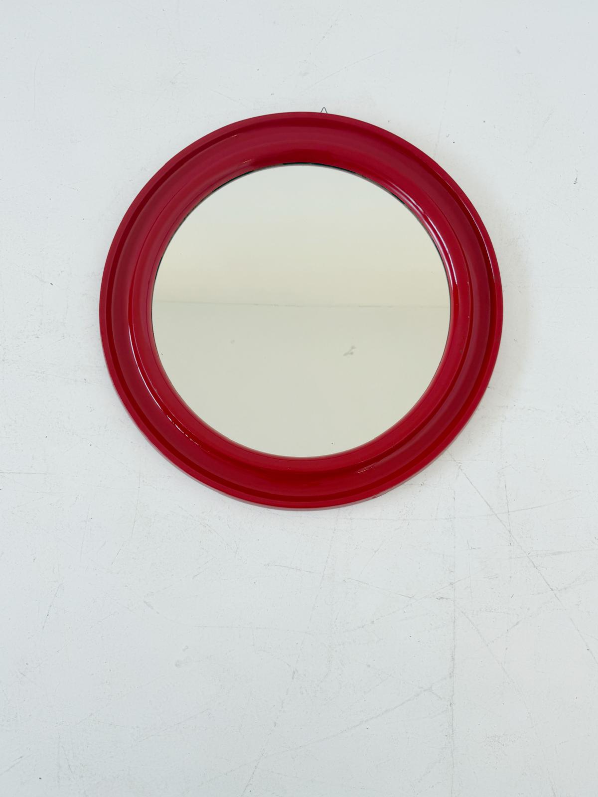 Round mirror with red plastic frame – Italy, 1970s/80s