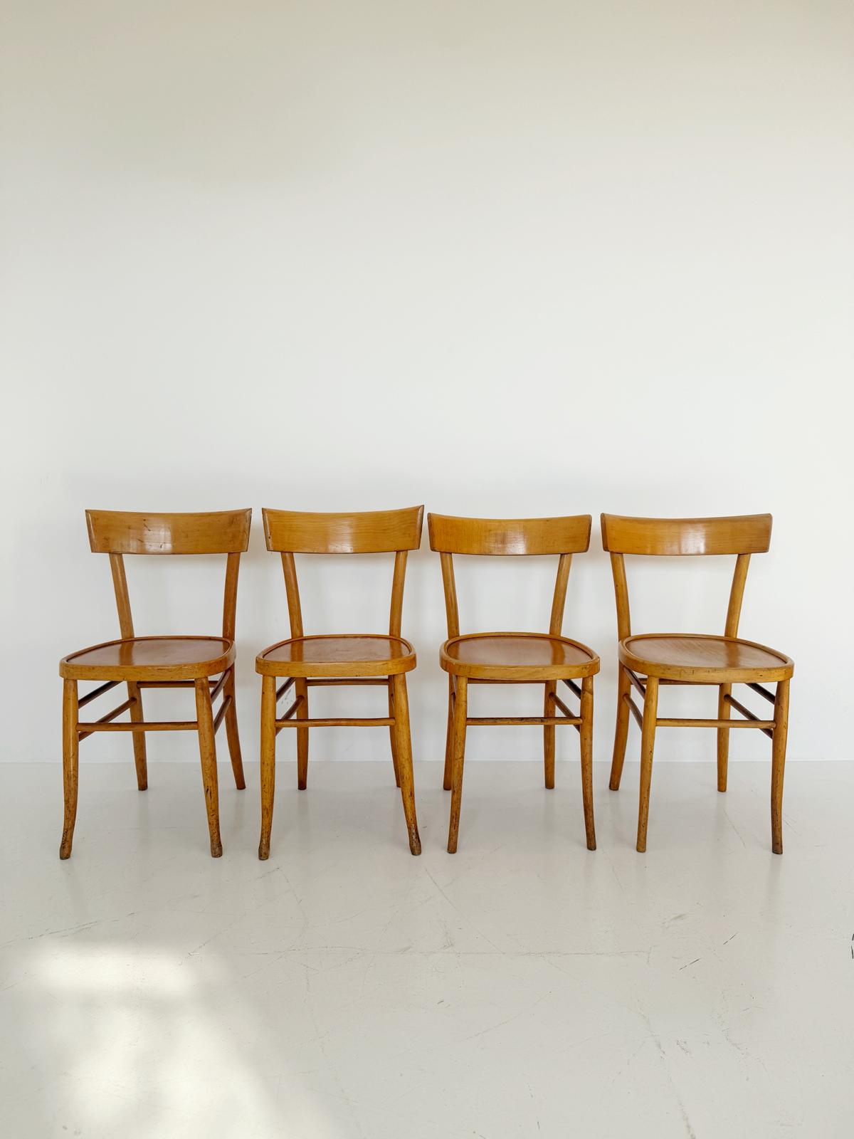 Set of 4 Vintage Wooden Chairs – Mid-20th Century Design