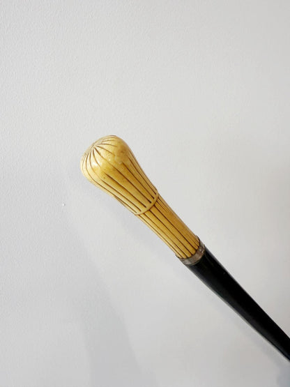 Walking stick with engraved bone handle, early 1900s