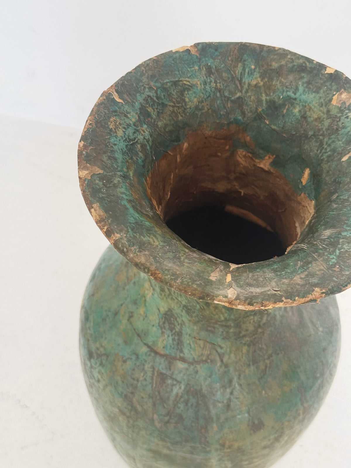 Turquoise papier-mâché vase with butterfly