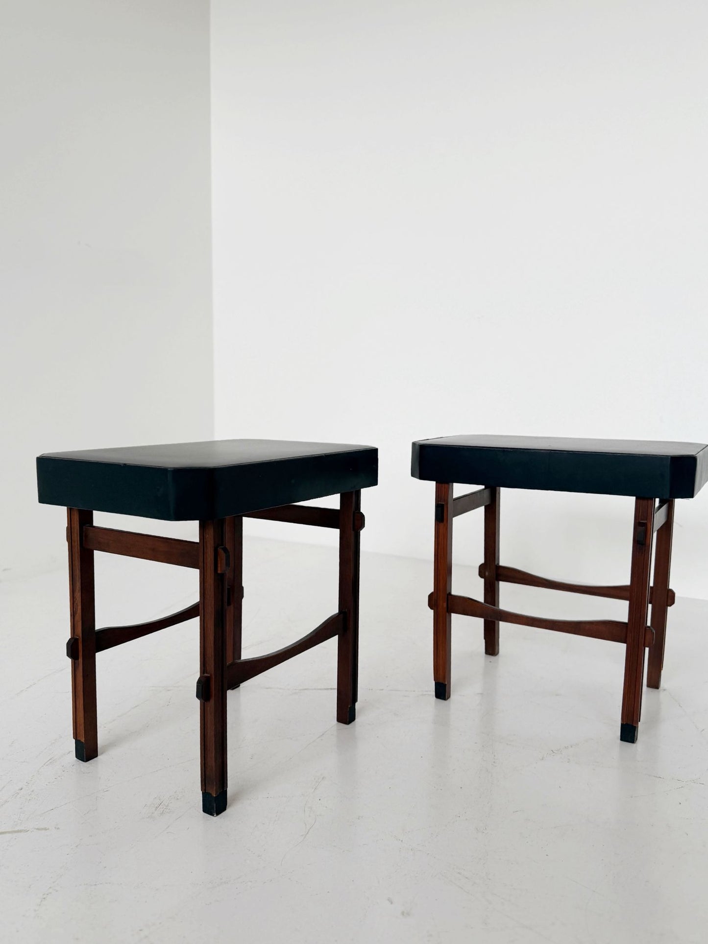 Pair of stools/seats in wood and black vinyl, 1950s–1960s