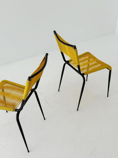 Pair of 1960s design chairs with metal frames and yellow woven detailing
