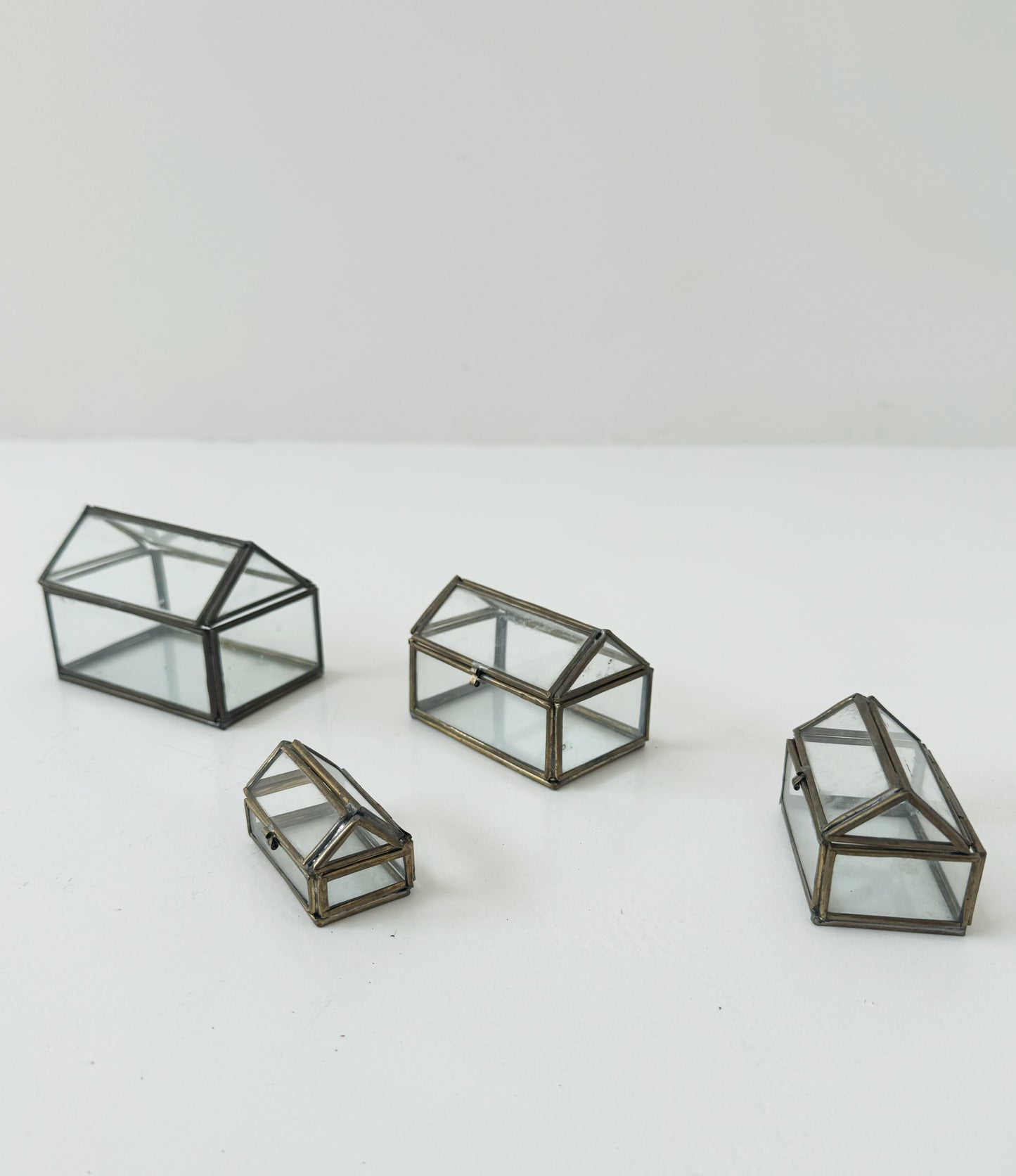 Set scatoline in vetro e ottone