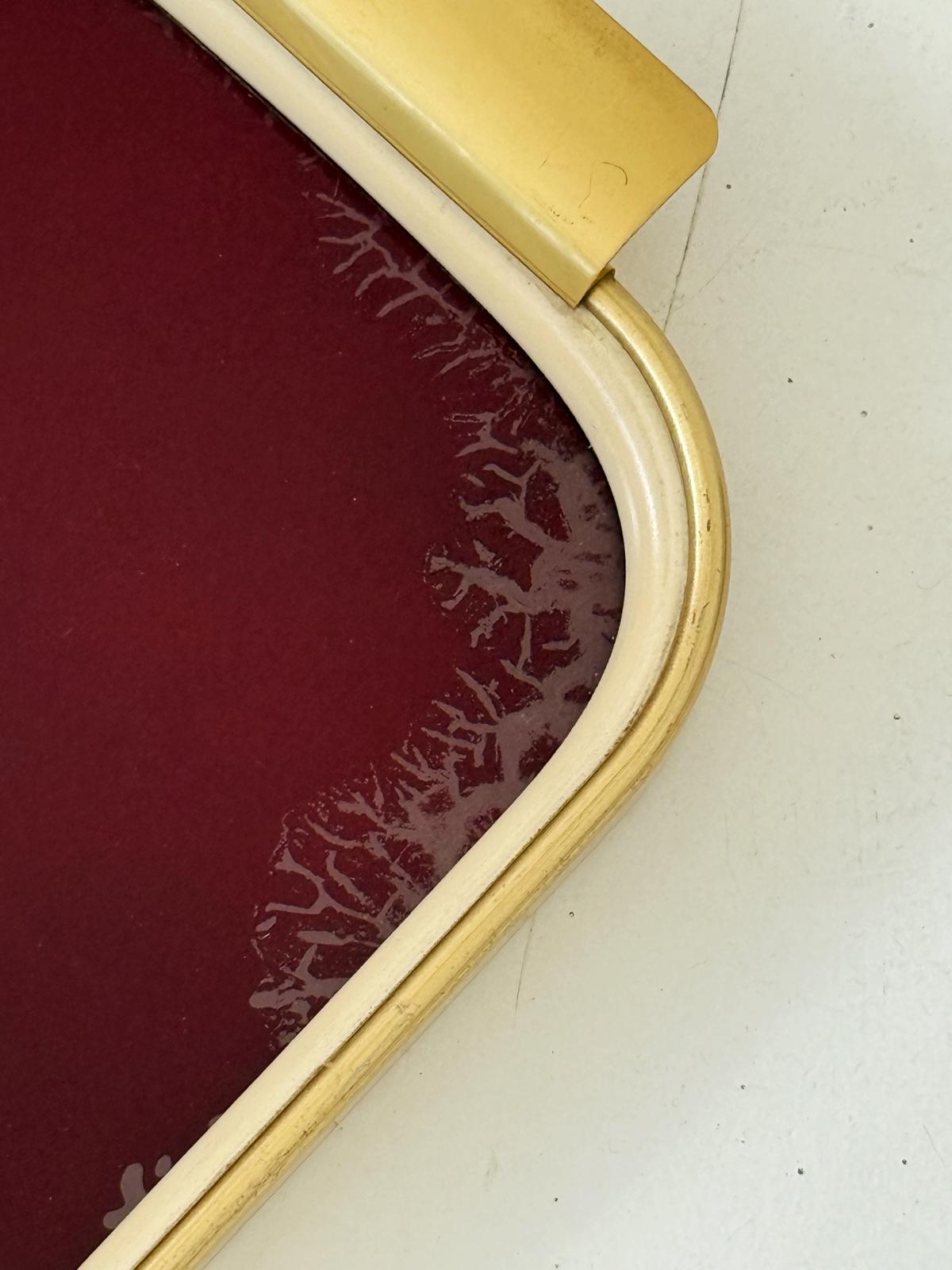 Vassoio in metallo dorato e vetro bordeaux, anni ’50-’60
