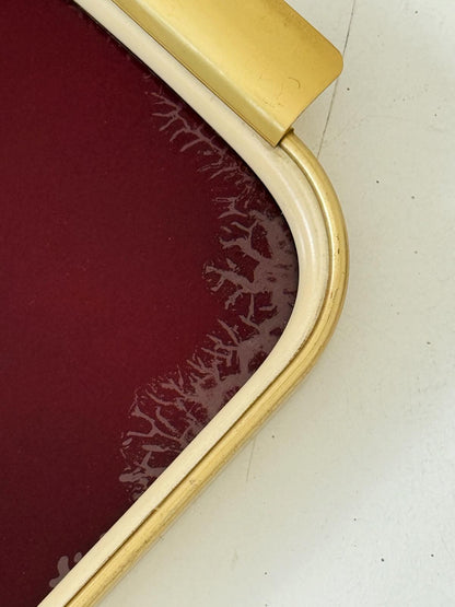 Vassoio in metallo dorato e vetro bordeaux, anni ’50-’60
