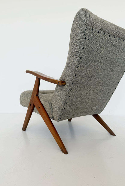 Reclining armchair in wood and fabric – 1960s