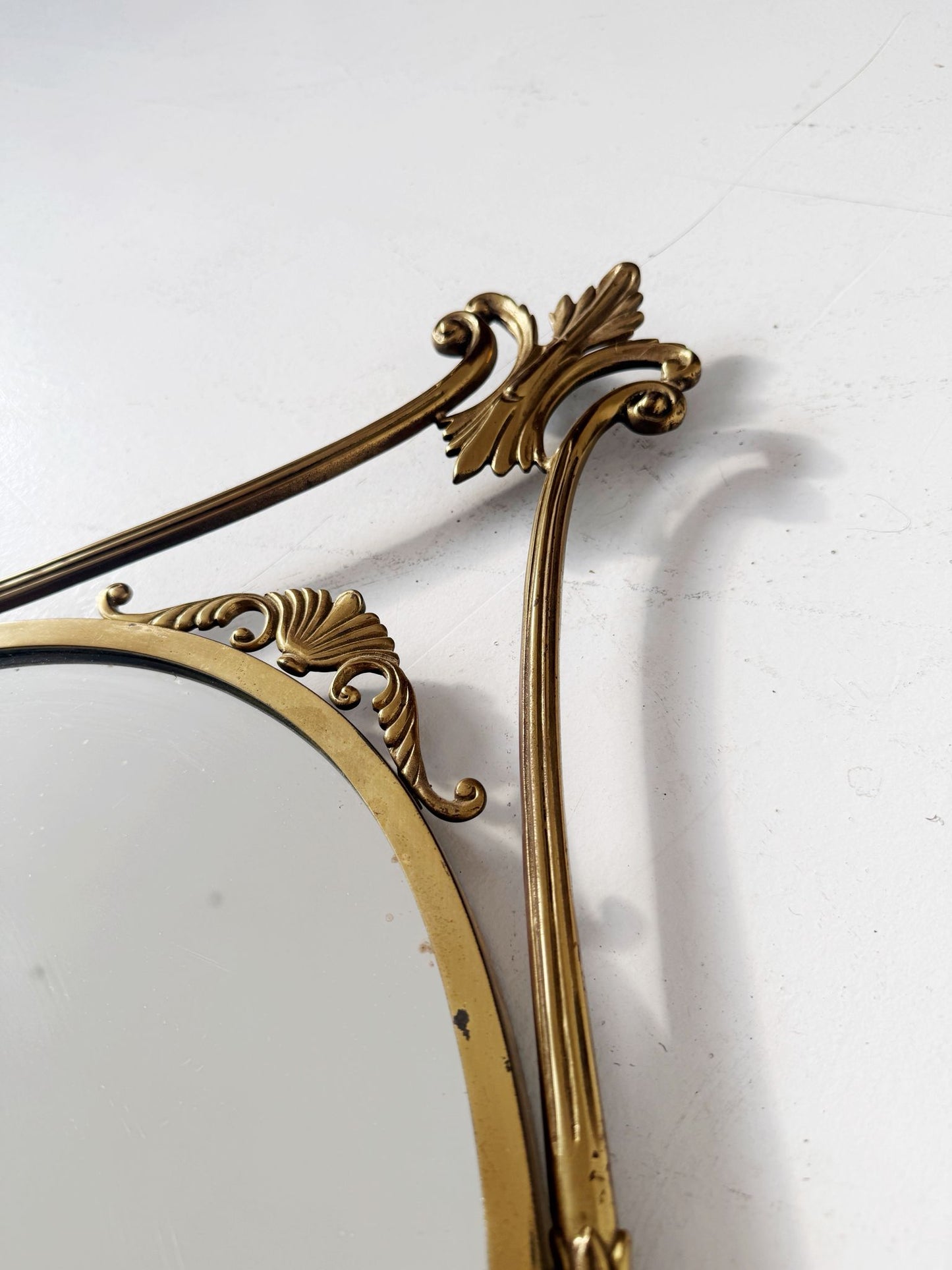 Oval brass mirror, Italy, 1950s