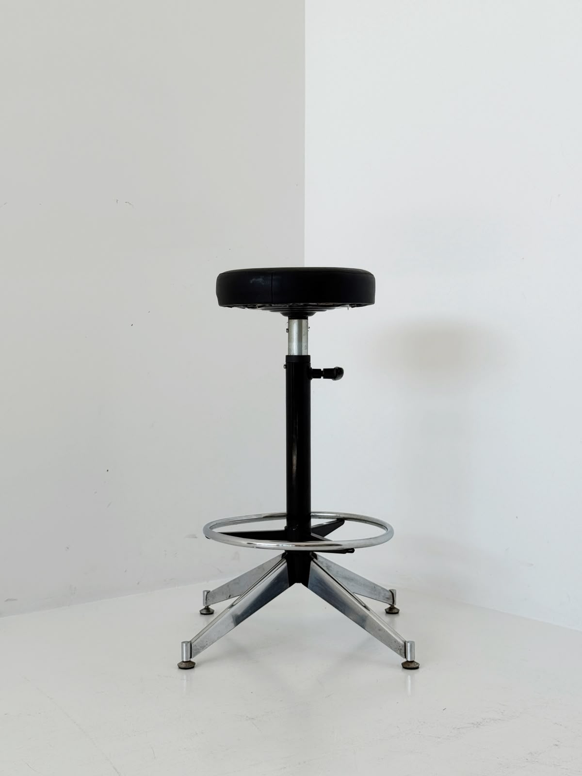 Adjustable industrial metal stool