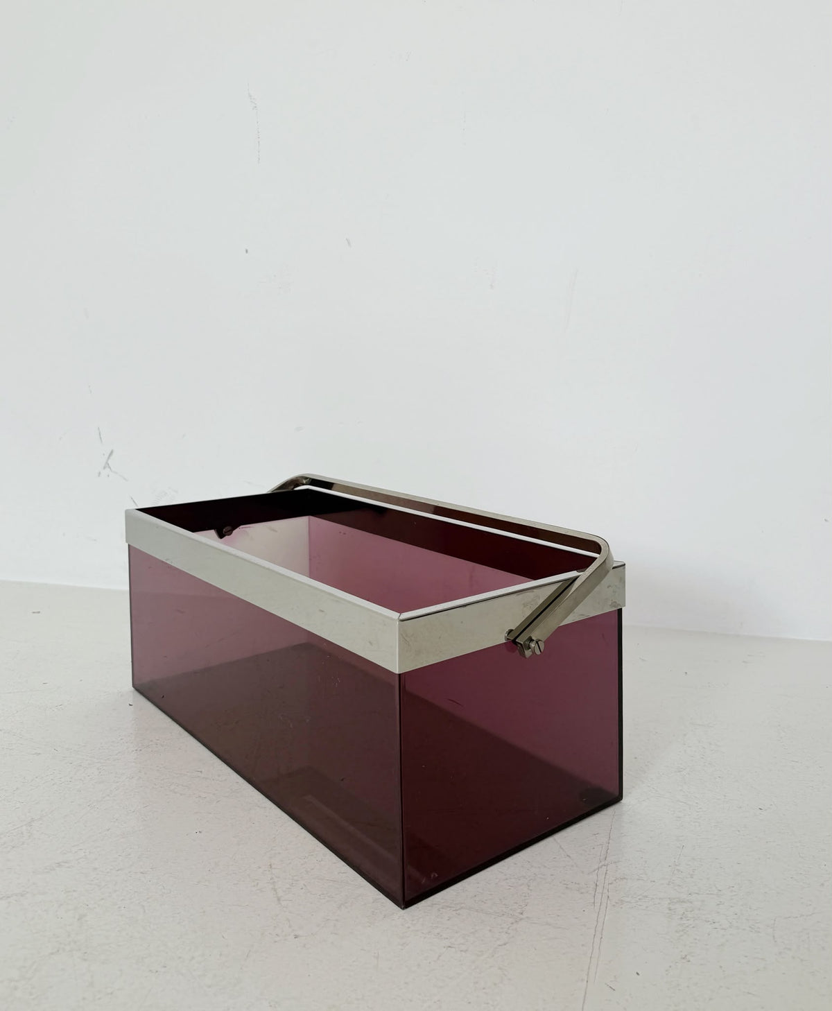 Wine-red Plexiglass container with chrome handle – 1970s