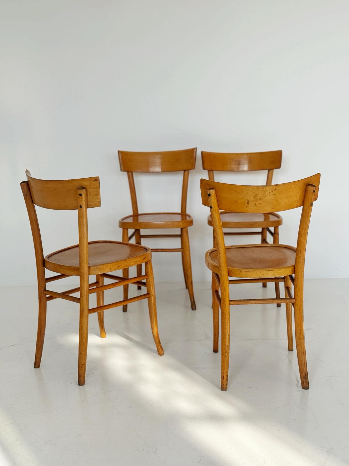 Set of 4 Vintage Wooden Chairs – Mid-20th Century Design