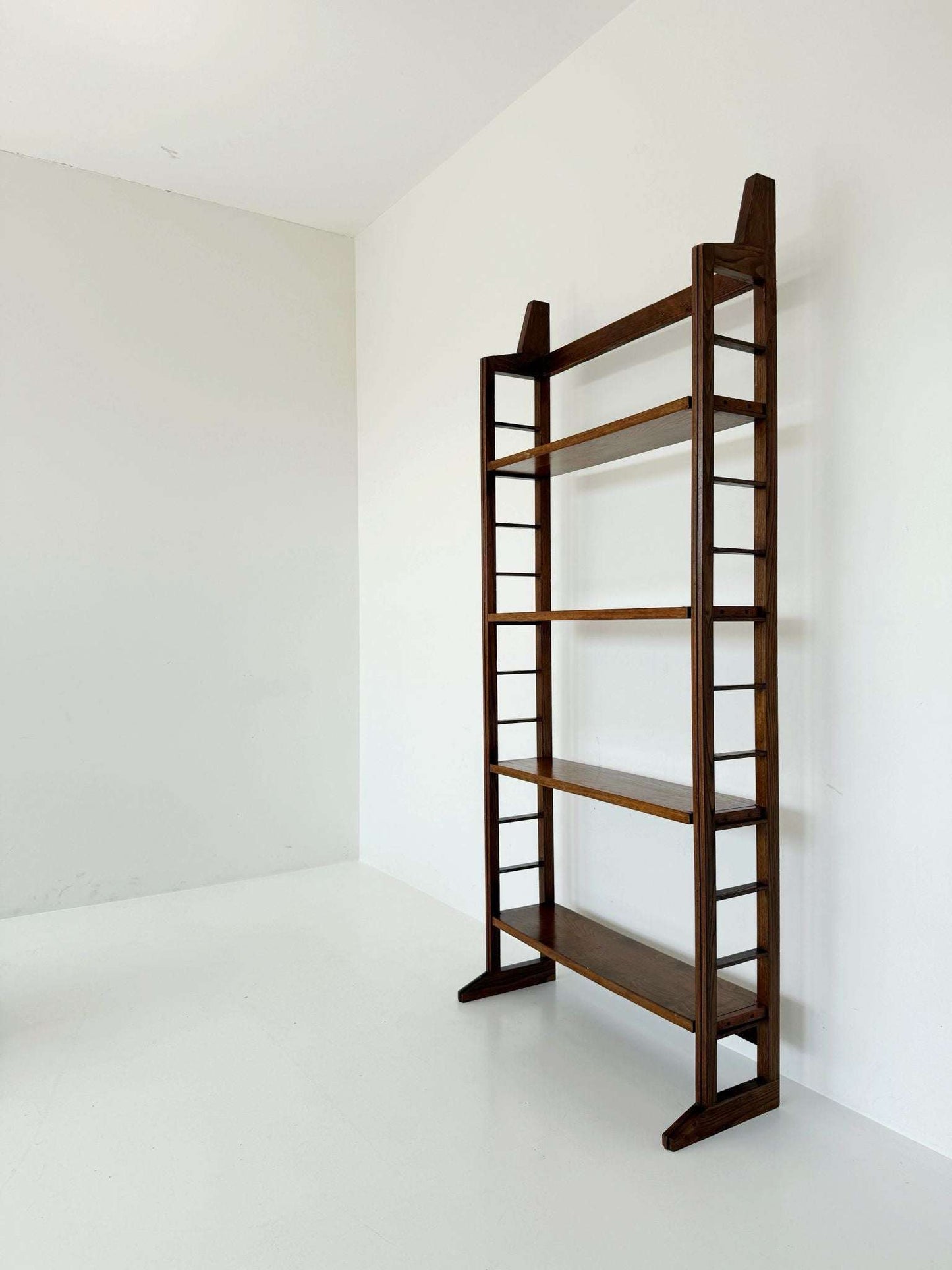 Modular wooden bookcase with removable shelves Italy, 1960s–1970s