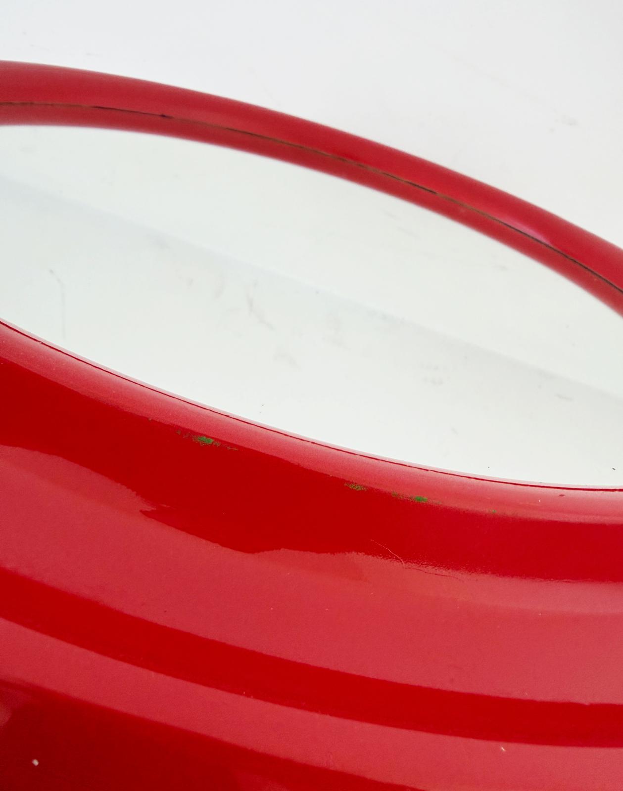 Round mirror with red plastic frame – Italy, 1970s/80s