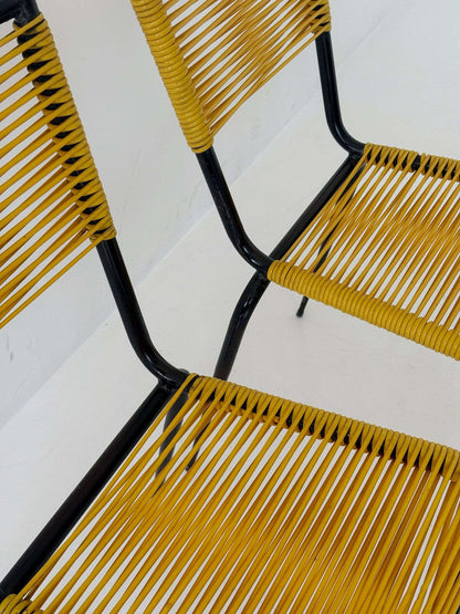 Pair of 1960s design chairs with metal frames and yellow woven detailing