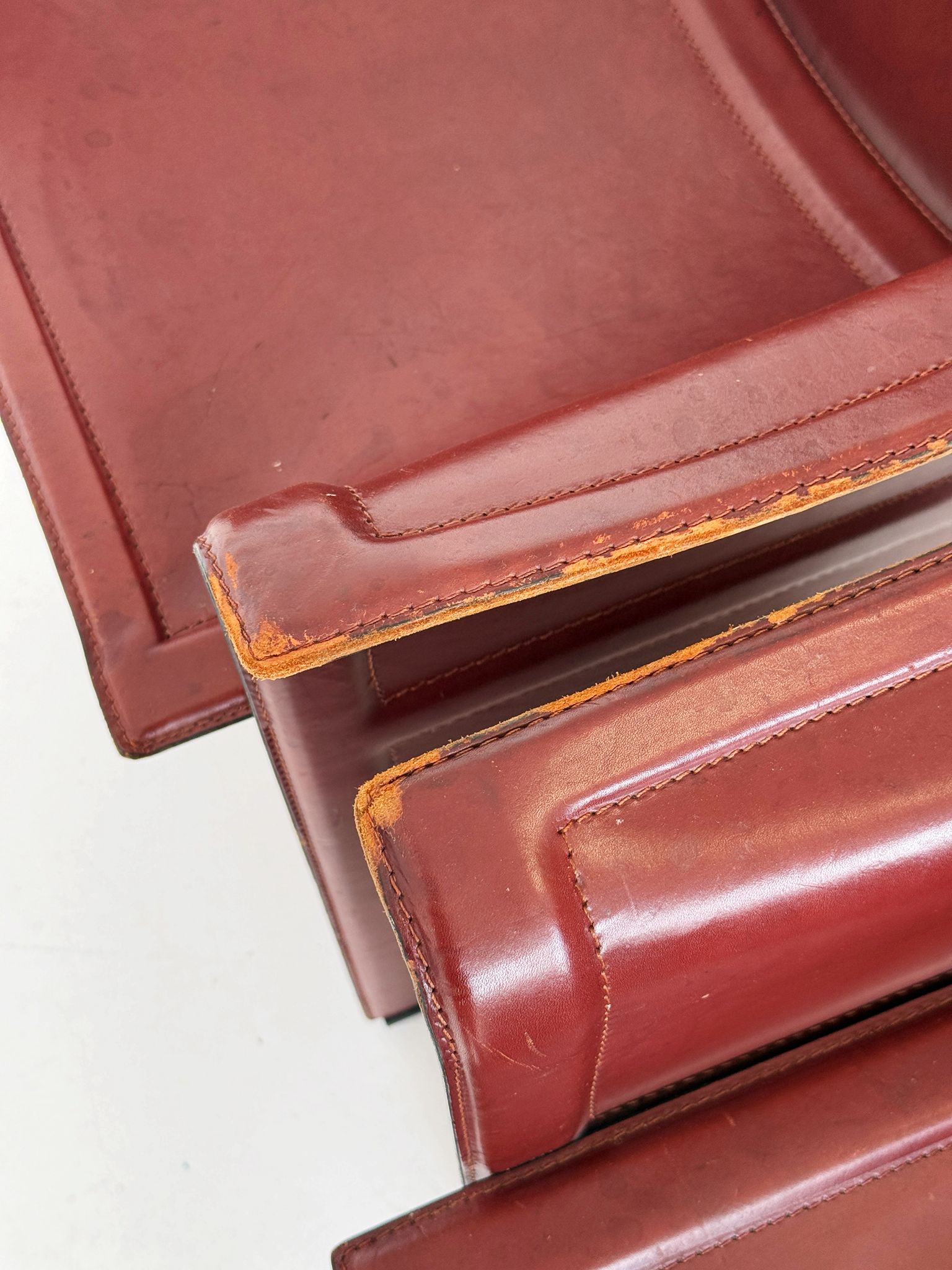 Set of four Matteo Grassi armchairs in burgundy leather, 1980s