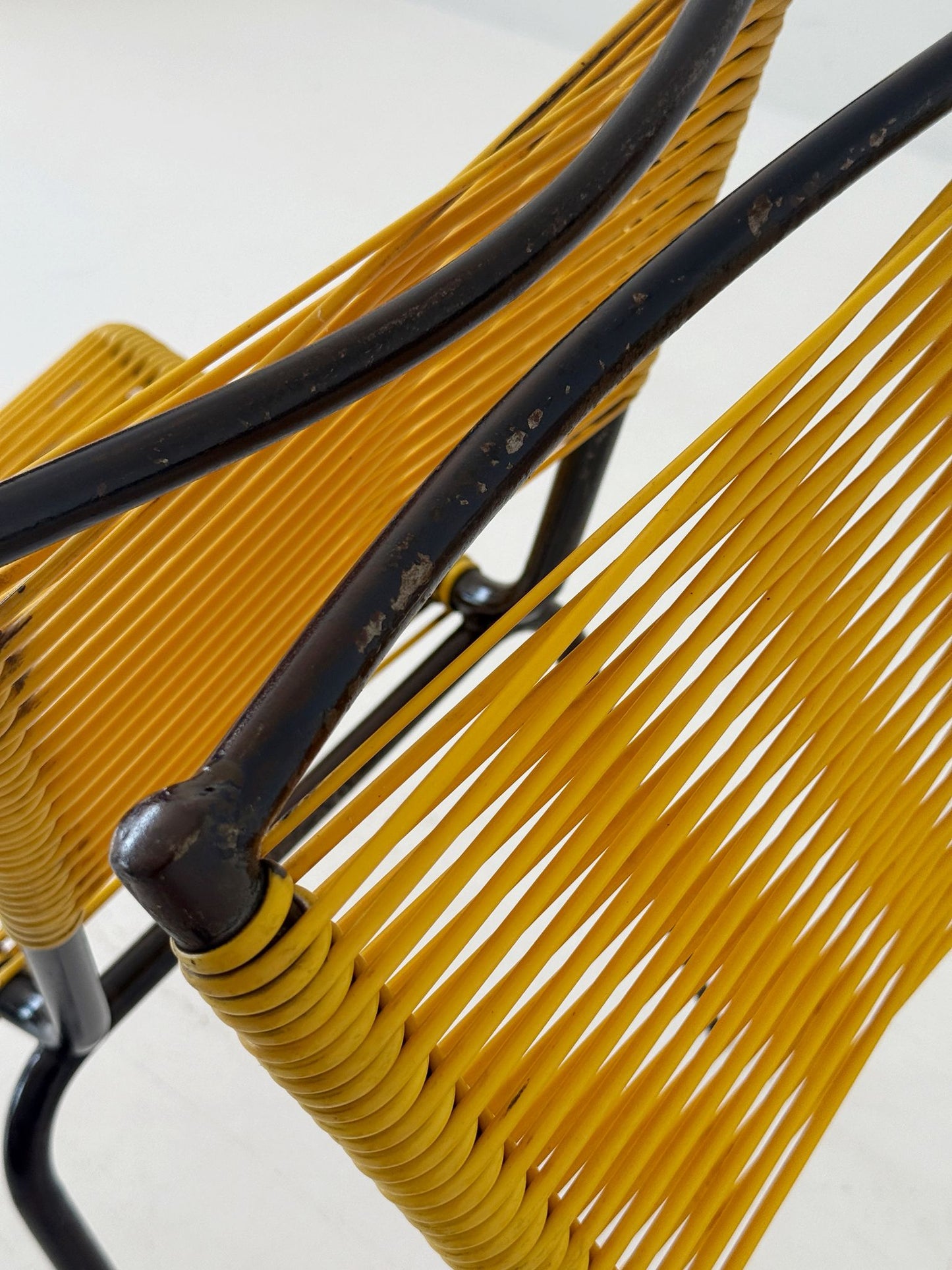 Pair of 1960s design chairs with metal frames and yellow woven detailing
