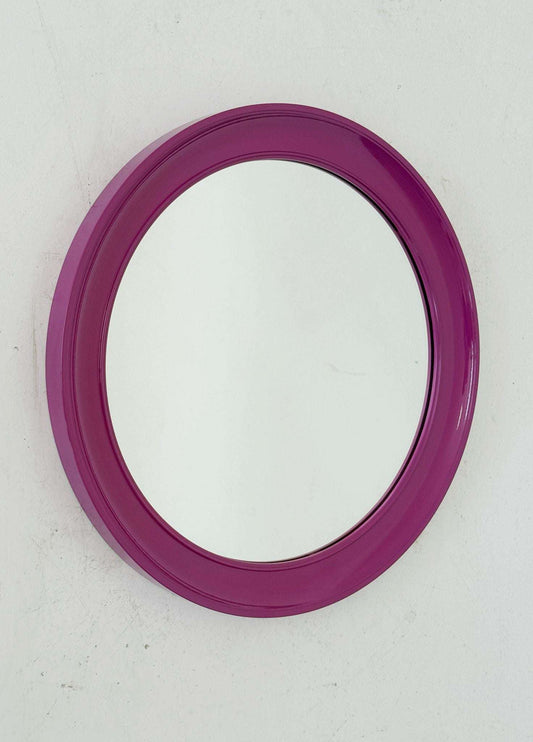 Round mirror with purple plastic frame