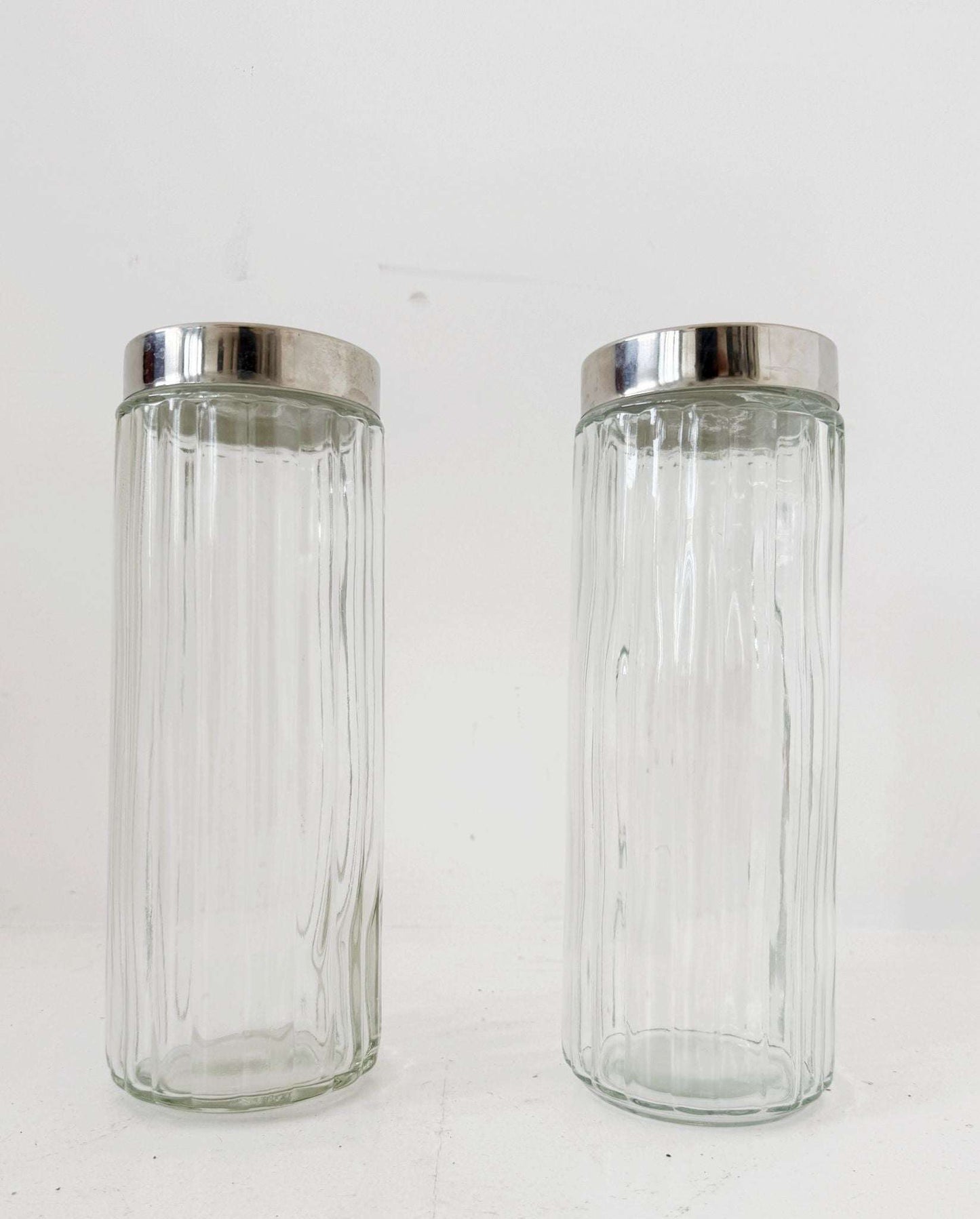 Pair of blown glass jars with metal lids, 1960s–1970s
