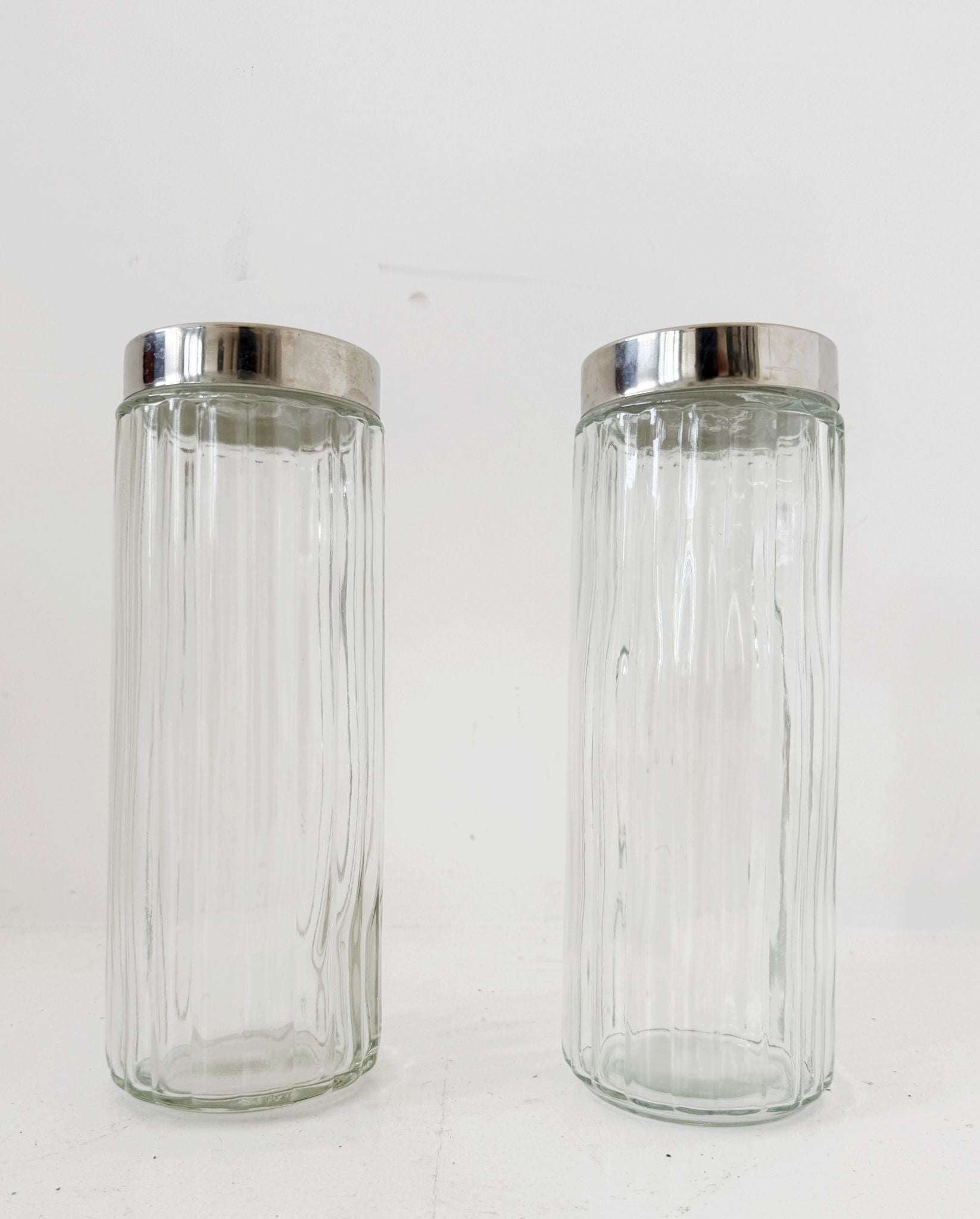 Pair of blown glass jars with metal lids, 1960s–1970s