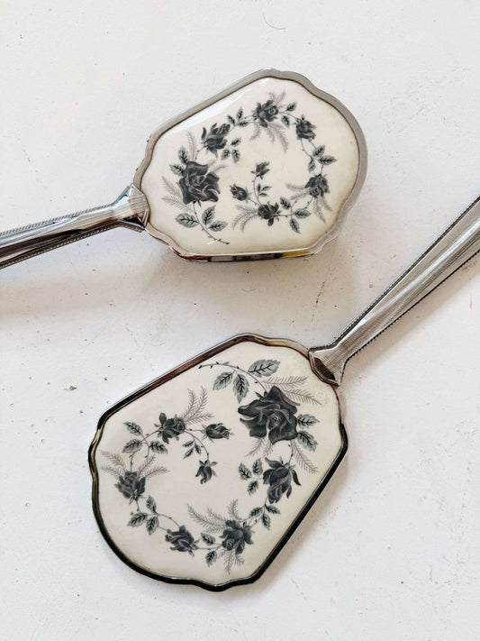 Vintage vanity set: mirror and brush with floral decoration