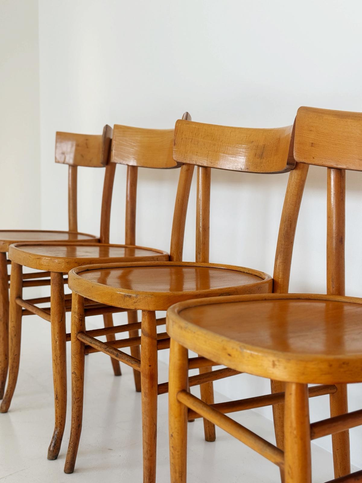 Set of 4 Vintage Wooden Chairs – Mid-20th Century Design