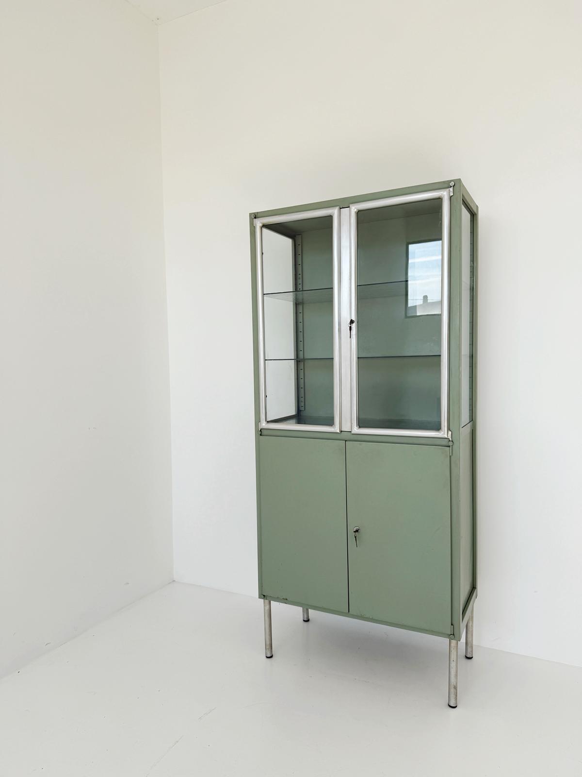 Sage green industrial display cabinet, 1950s