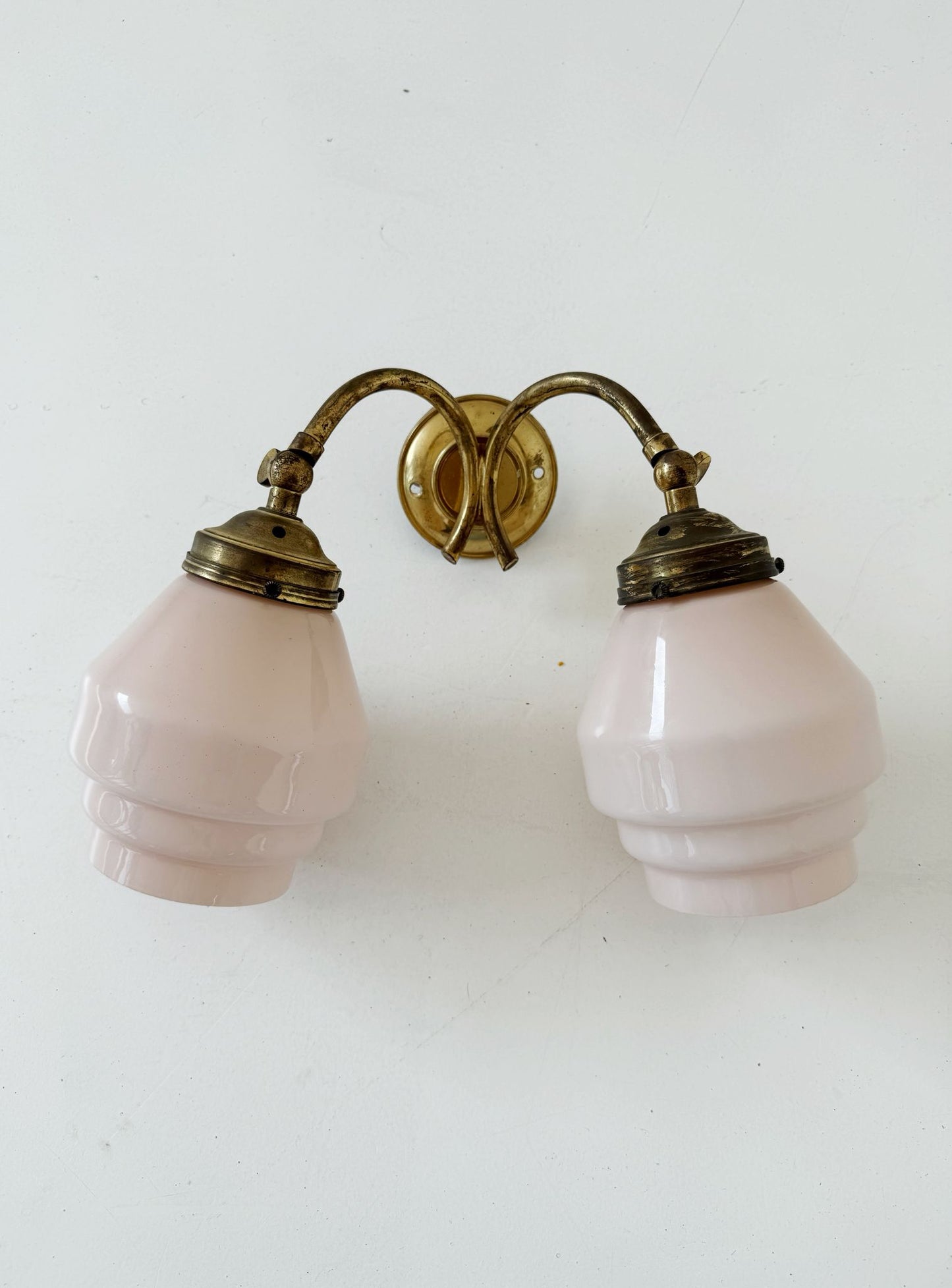 Double-arm wall light in brass and pink opaline glass, 1940s-1950s