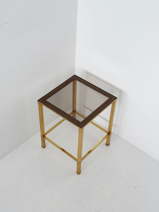 Square coffee table in gold-tone metal and smoked glass – 1970s