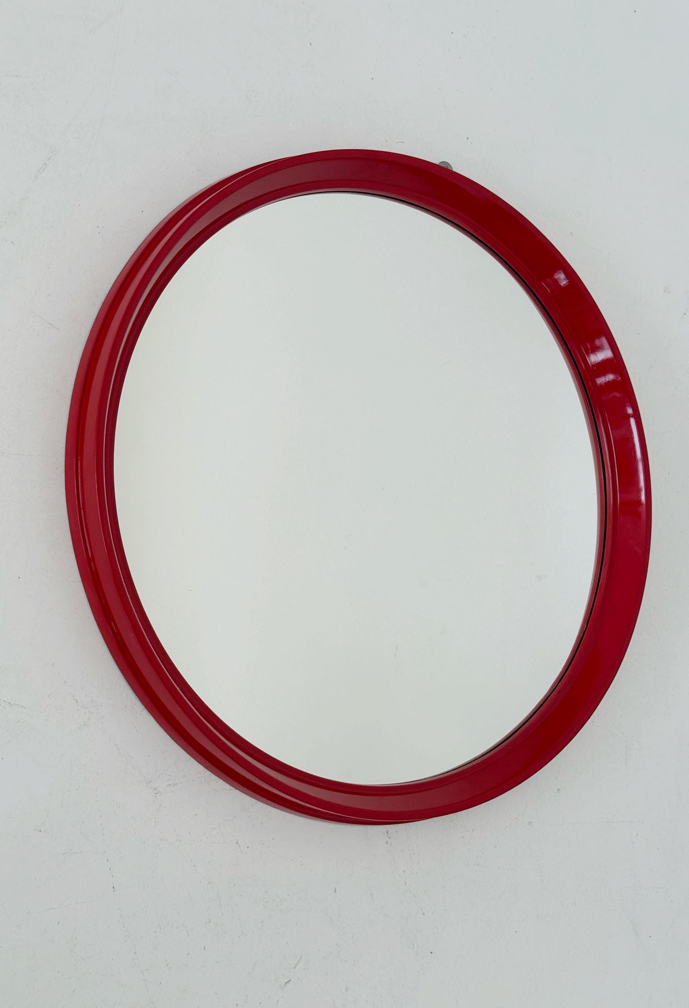 Round mirror with red lacquered frame – 1960