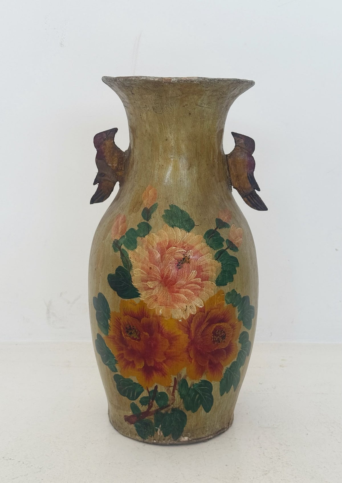 Polychrome papier-mâché vase with zoomorphic appliqués