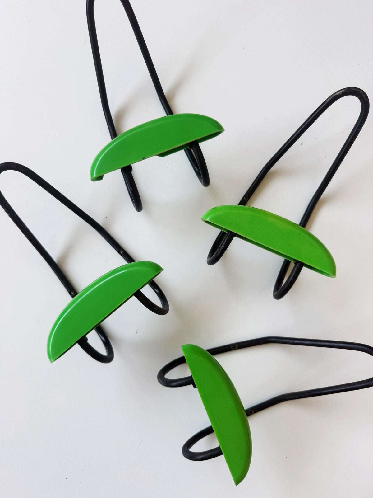 Modernist wall-mounted coat rack in metal and green ABS, 1970s