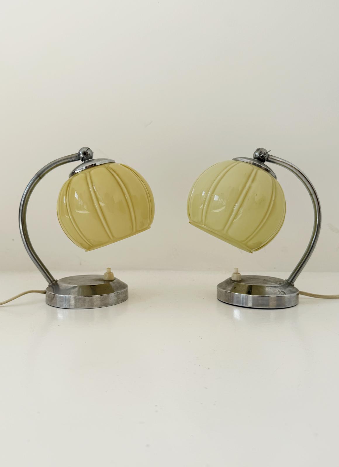 Pair of Space Age lampshades in chromed metal and yellow glass, 1960s