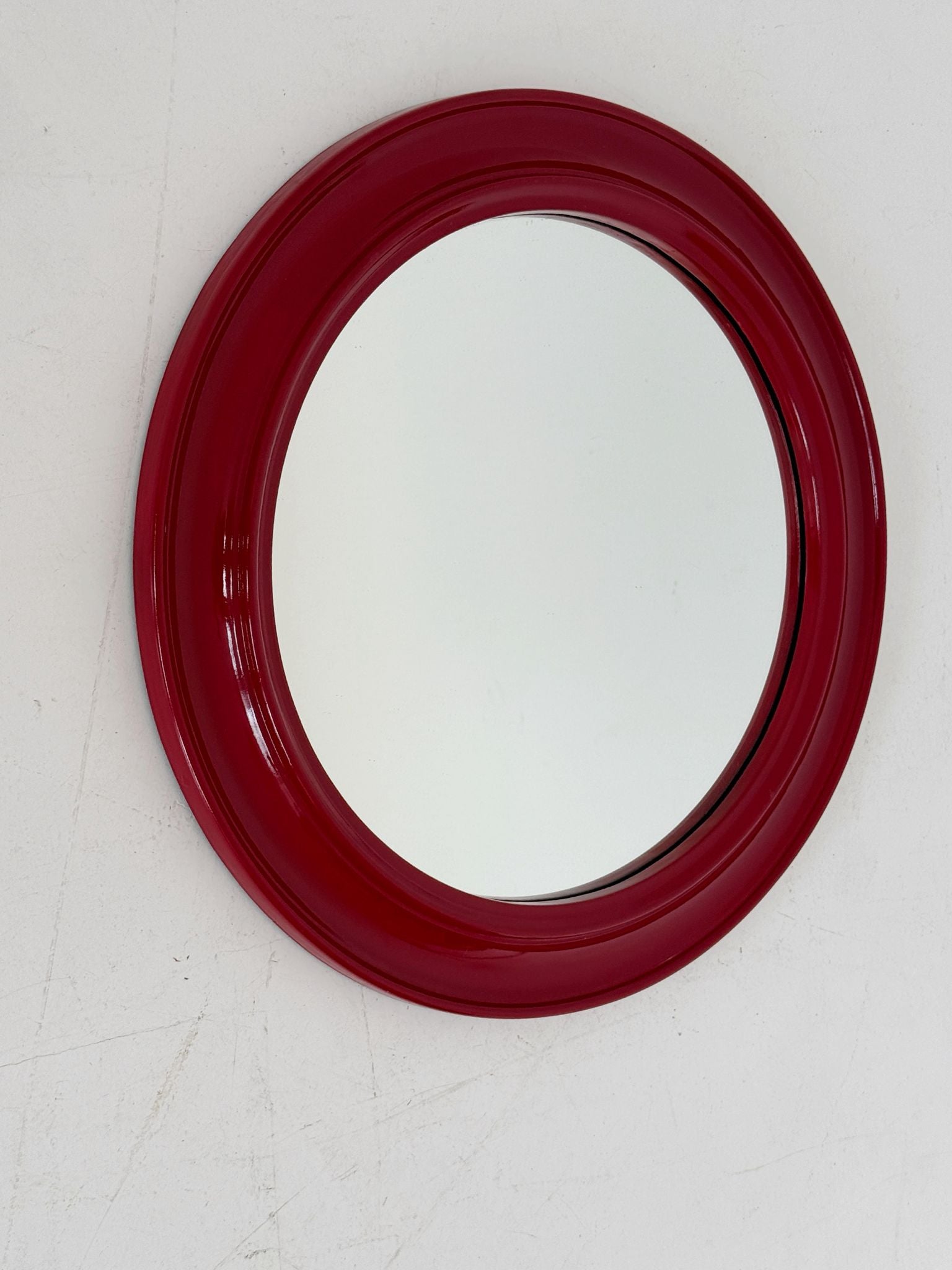 Round mirror with red lacquered wooden frame, 1970s