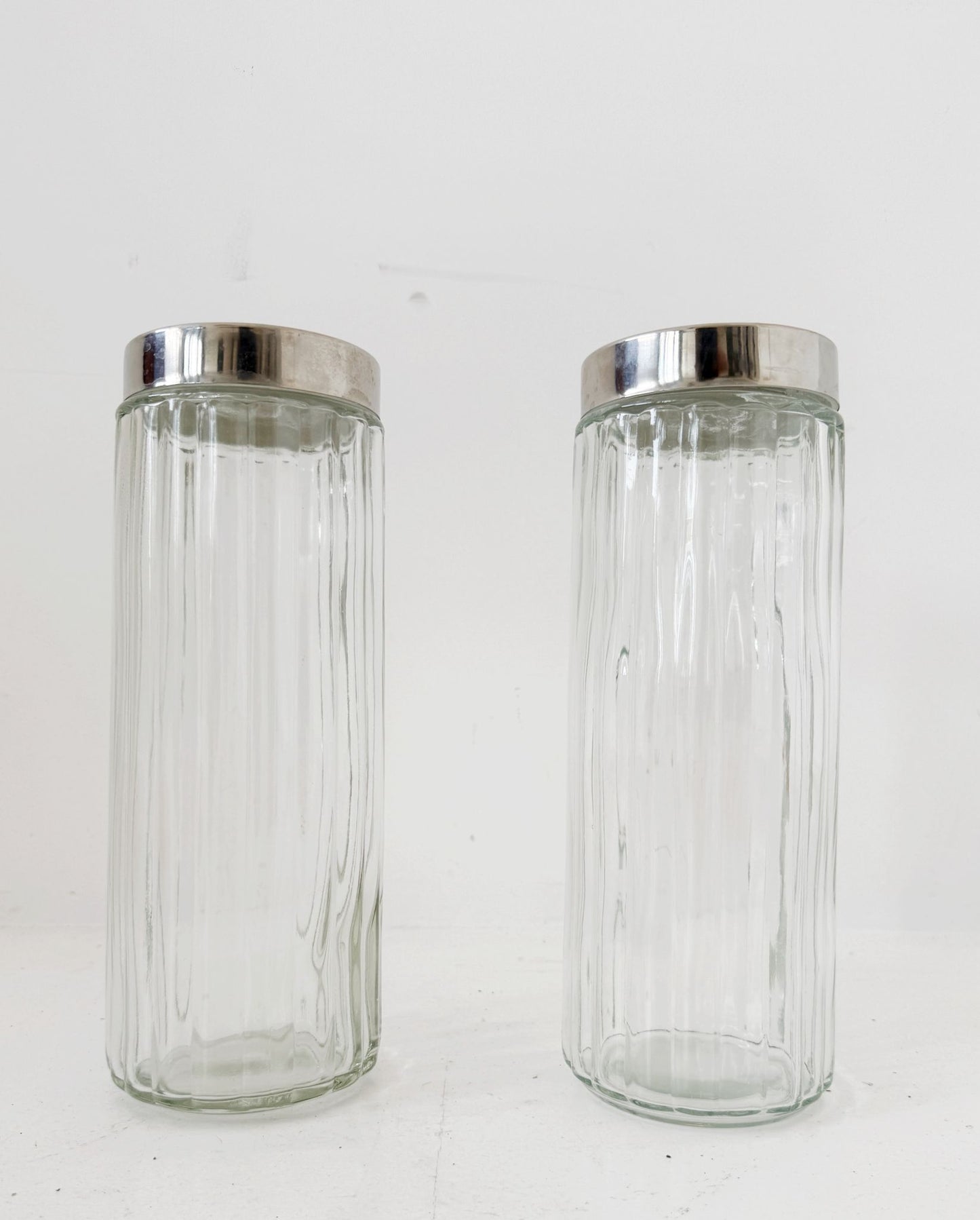 Pair of blown glass jars with metal lids, 1960s–1970s