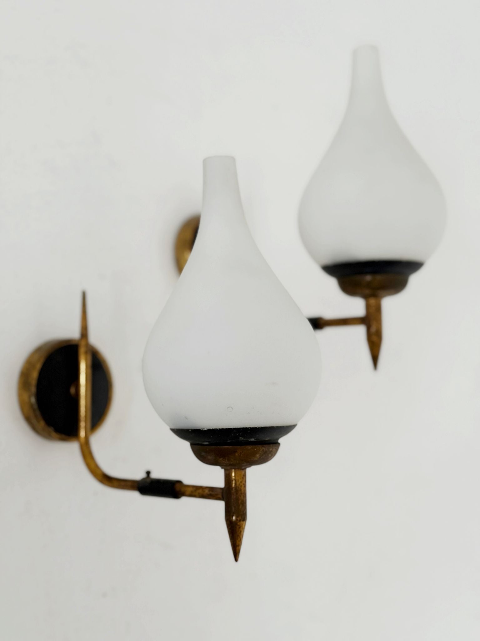 A pair of 1950s/1960s wall lamps