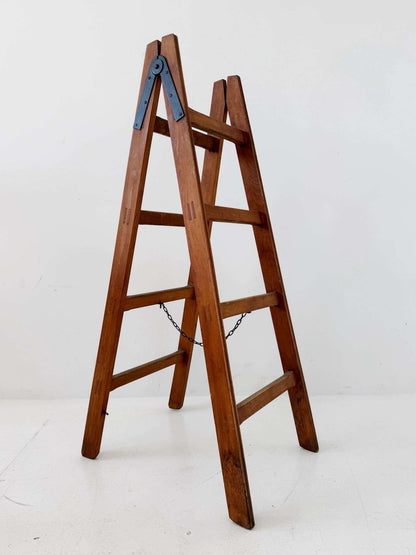 Wooden A-frame ladder with iron hardware, mid-20th century