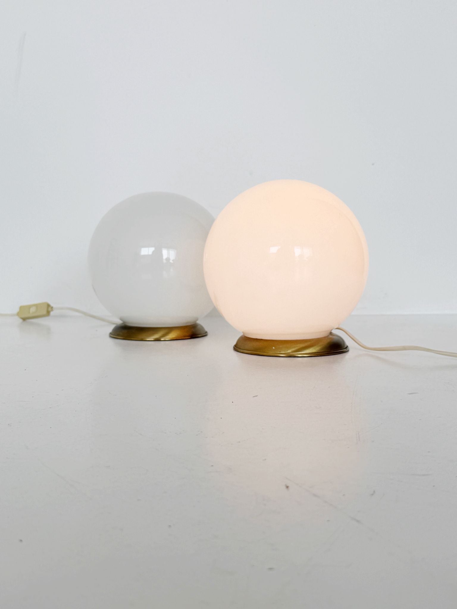 Pair of opal glass sphere table lamps