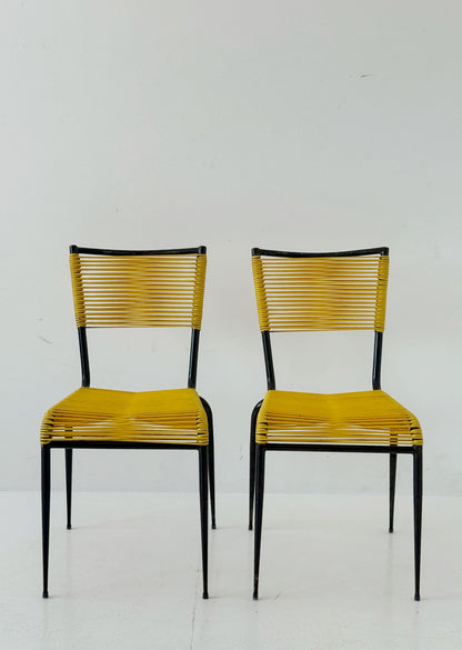 Pair of 1960s design chairs with metal frames and yellow woven detailing