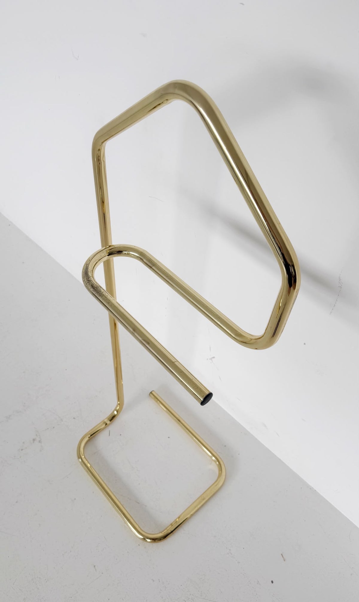 Gold-tone metal valet stand, 1960