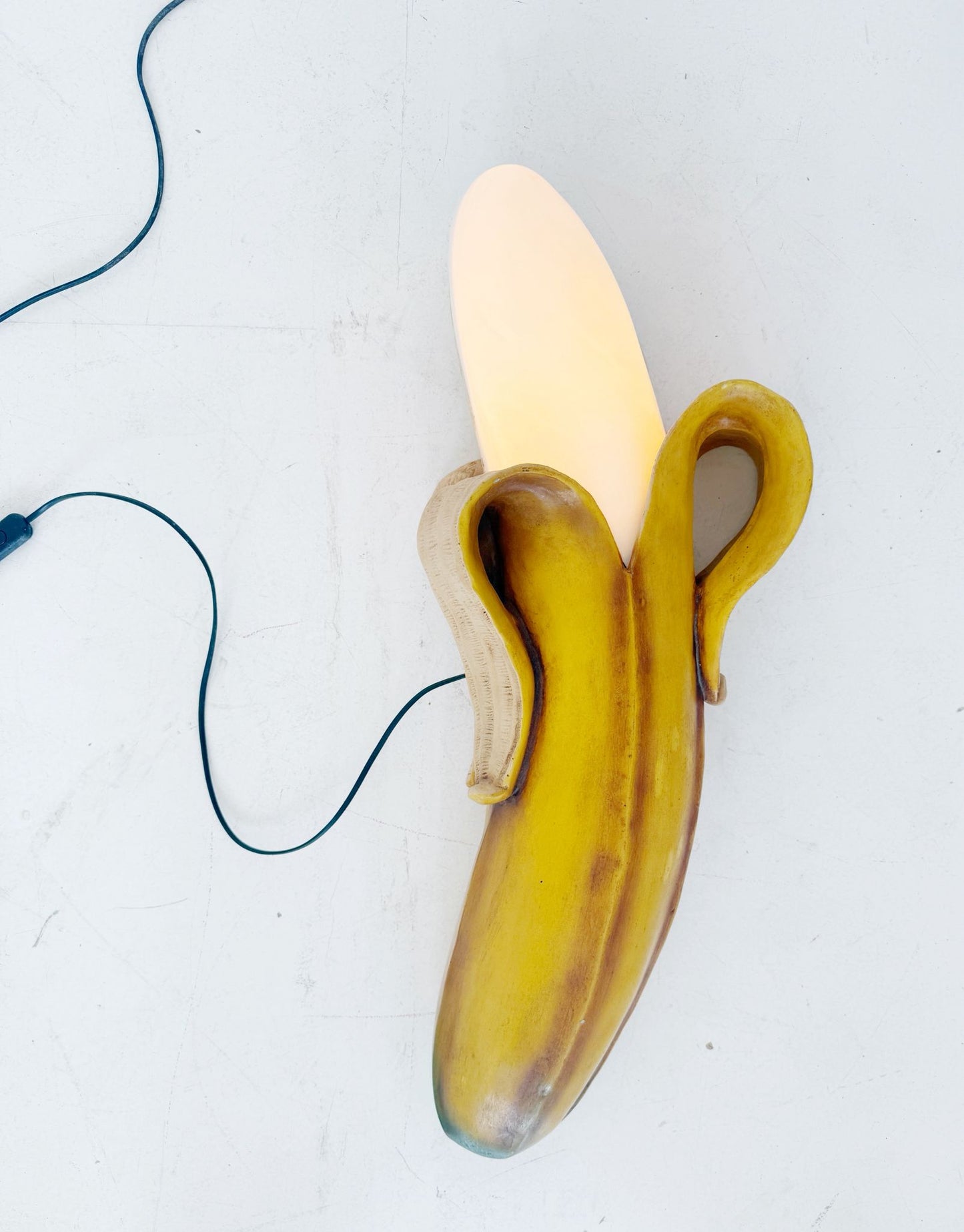 Banana-shaped sculptural wall lamp, 1970s/80s
