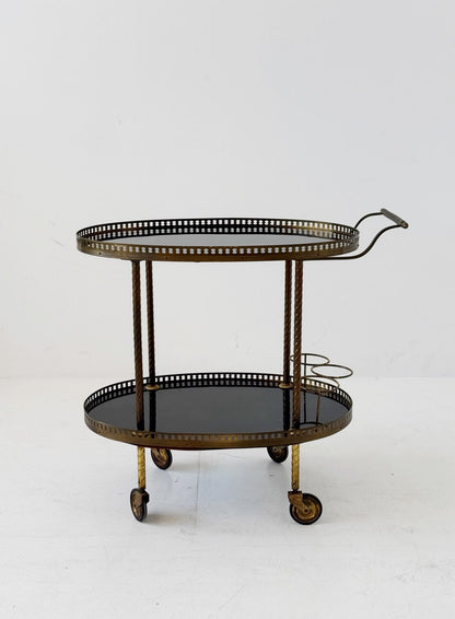 Oval brass and lacquered wood bar cart, 1950s/60s