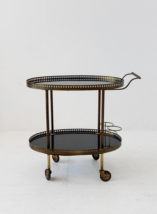Oval brass and lacquered wood bar cart, 1950s/60s