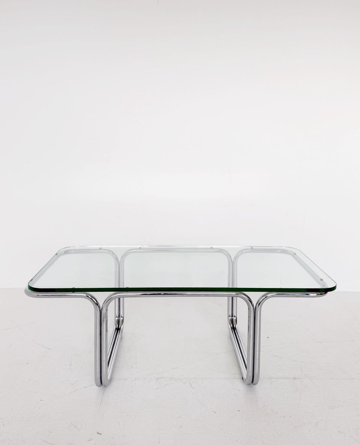 Rectangular coffee table in glass and chrome-plated steel, attributed to Gruppo DAM – Italy, 1970s