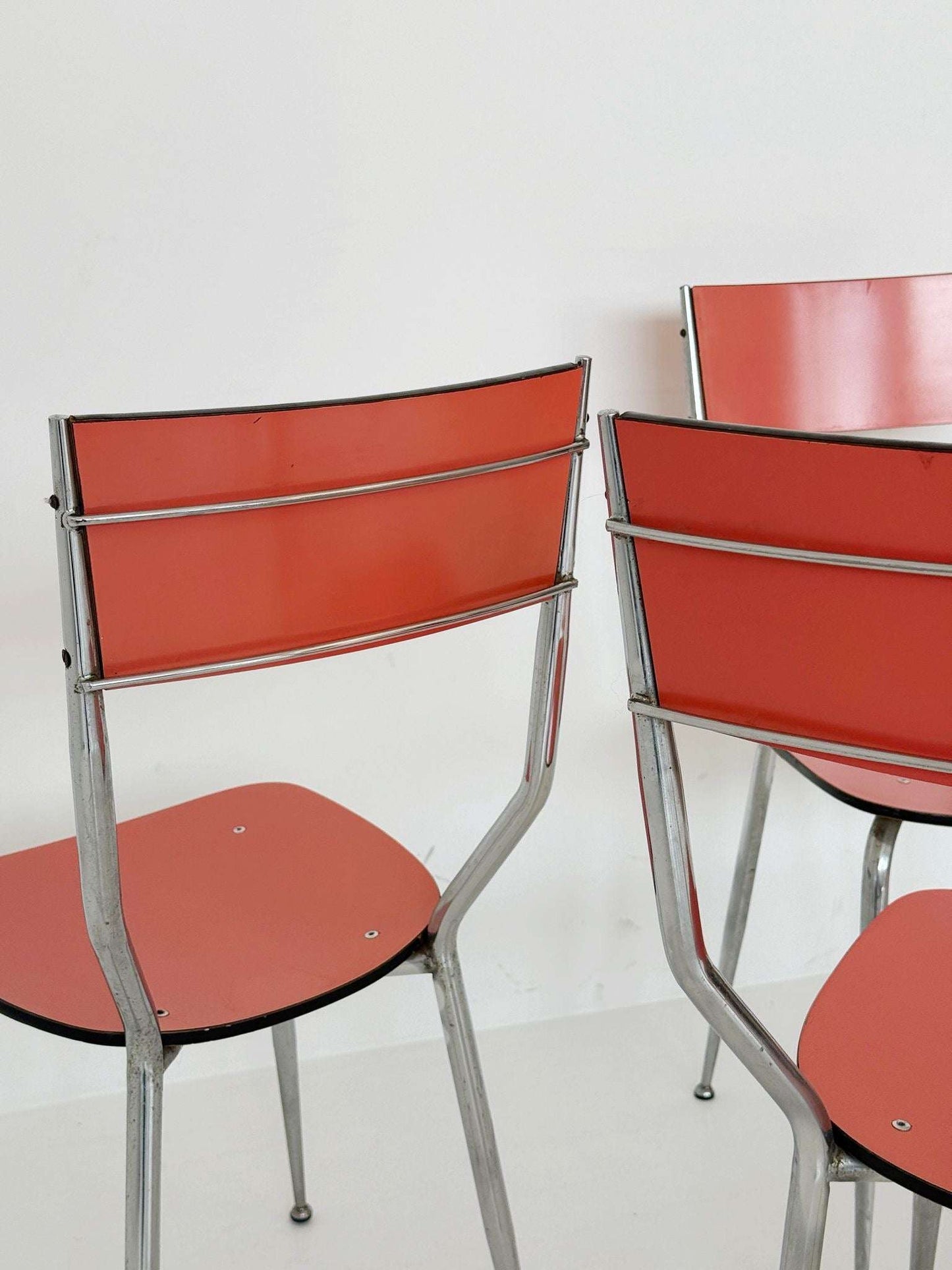 Set of 4 chairs in salmon-colored laminate and chromed metal, Italy, 1970s