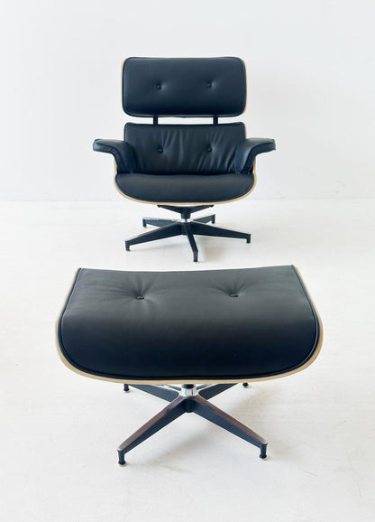 Poltrona girevole in pelle ispirata all'iconica Eames Lounge Chair