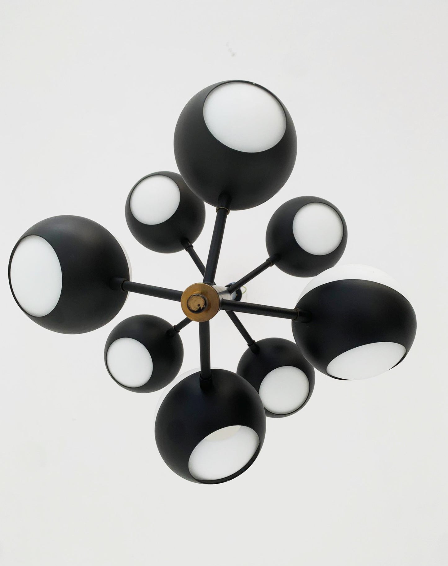 Black chandelier with glass spheres