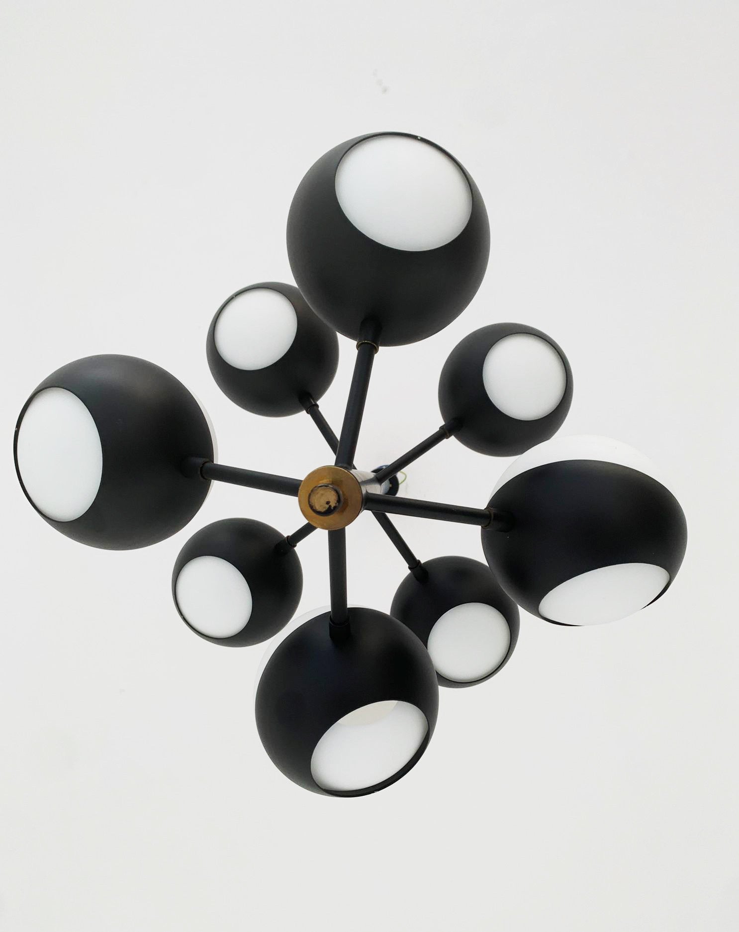 Black chandelier with glass spheres