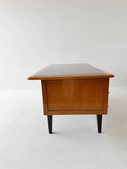 Desk with brown glass top